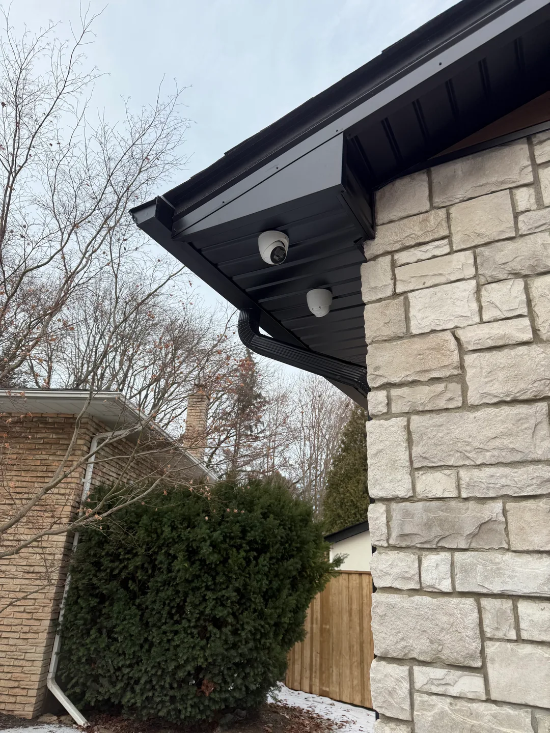 High-end CCTV installation — dual-angle corner security camera system for luxury GTA home with concealed wiring