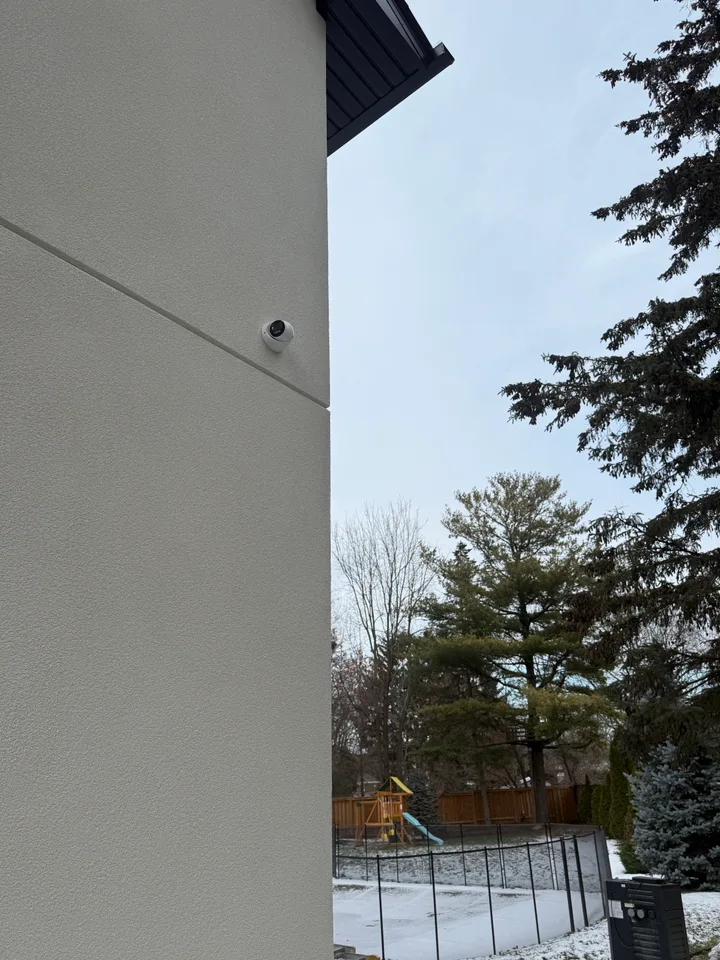 Concealed security wiring — full perimeter CCTV camera coverage for high-value Toronto property, AI-powered monitoring